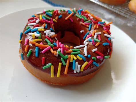 Sprinkle donut - Instructions. Preheat the oven to 400 degrees F and spray a donut pan with cooking spray. To prepare the donuts, mix all the dry ingredients together in a bowl. Mix the wet ingredients together in a separate bowl. Pour the wet ingredients into the dry and mix together until combined, then add the sprinkles and fold in.